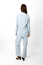 Baby Bleu linen set by R.K Elégance, belted, soft fabric with a stylish design, displayed on a neutral background.
